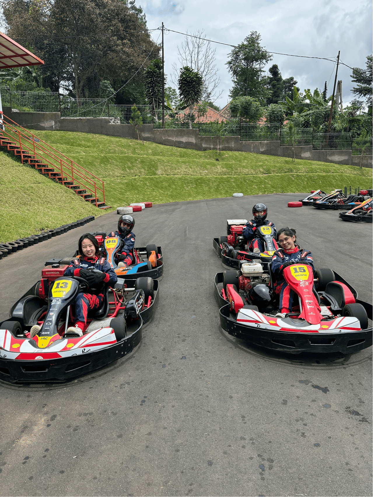 Jodith Valerie enjoying go-kart activity with friends, behind the scenes of a product designer