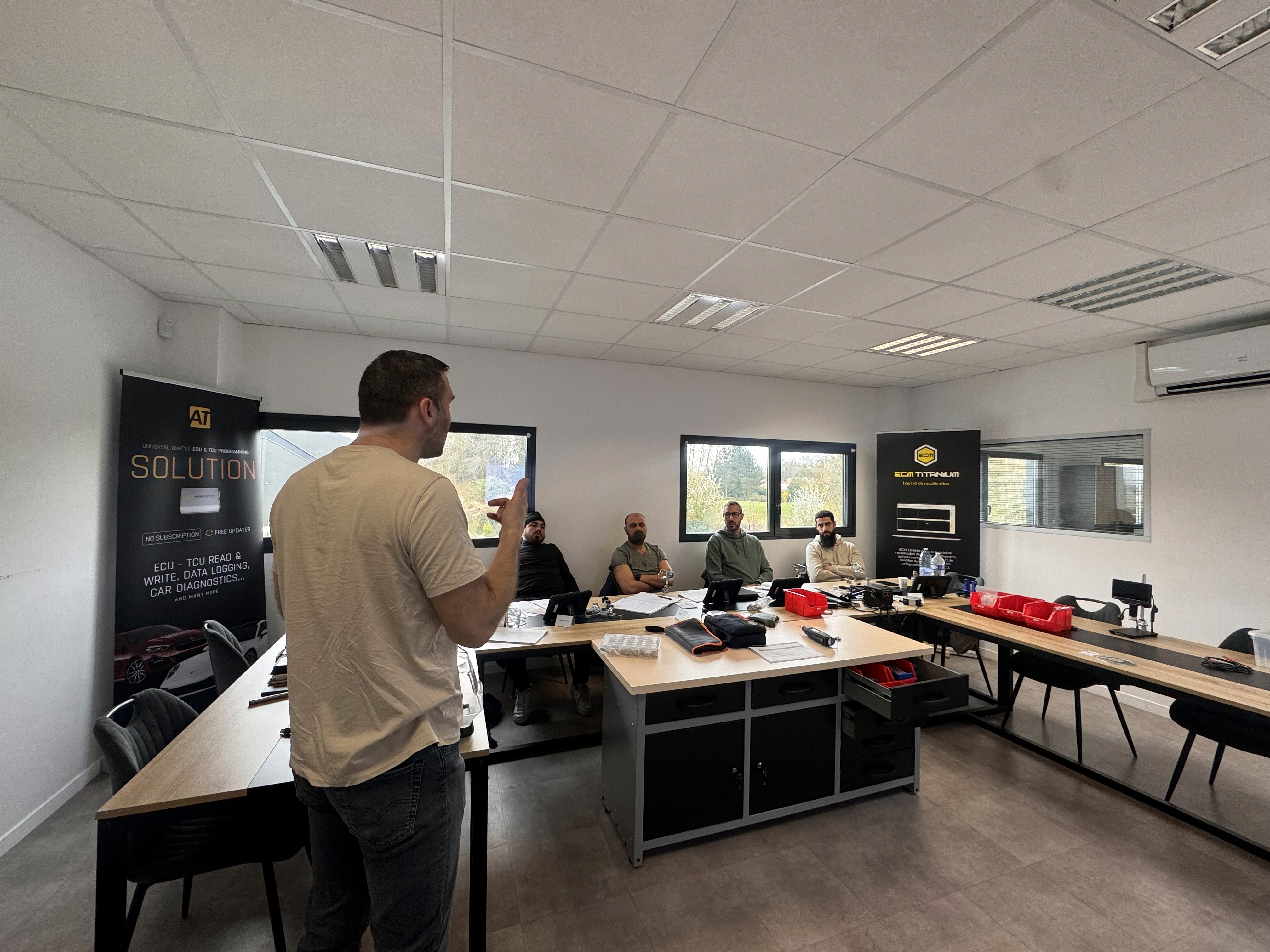 A man standing with Sufboard