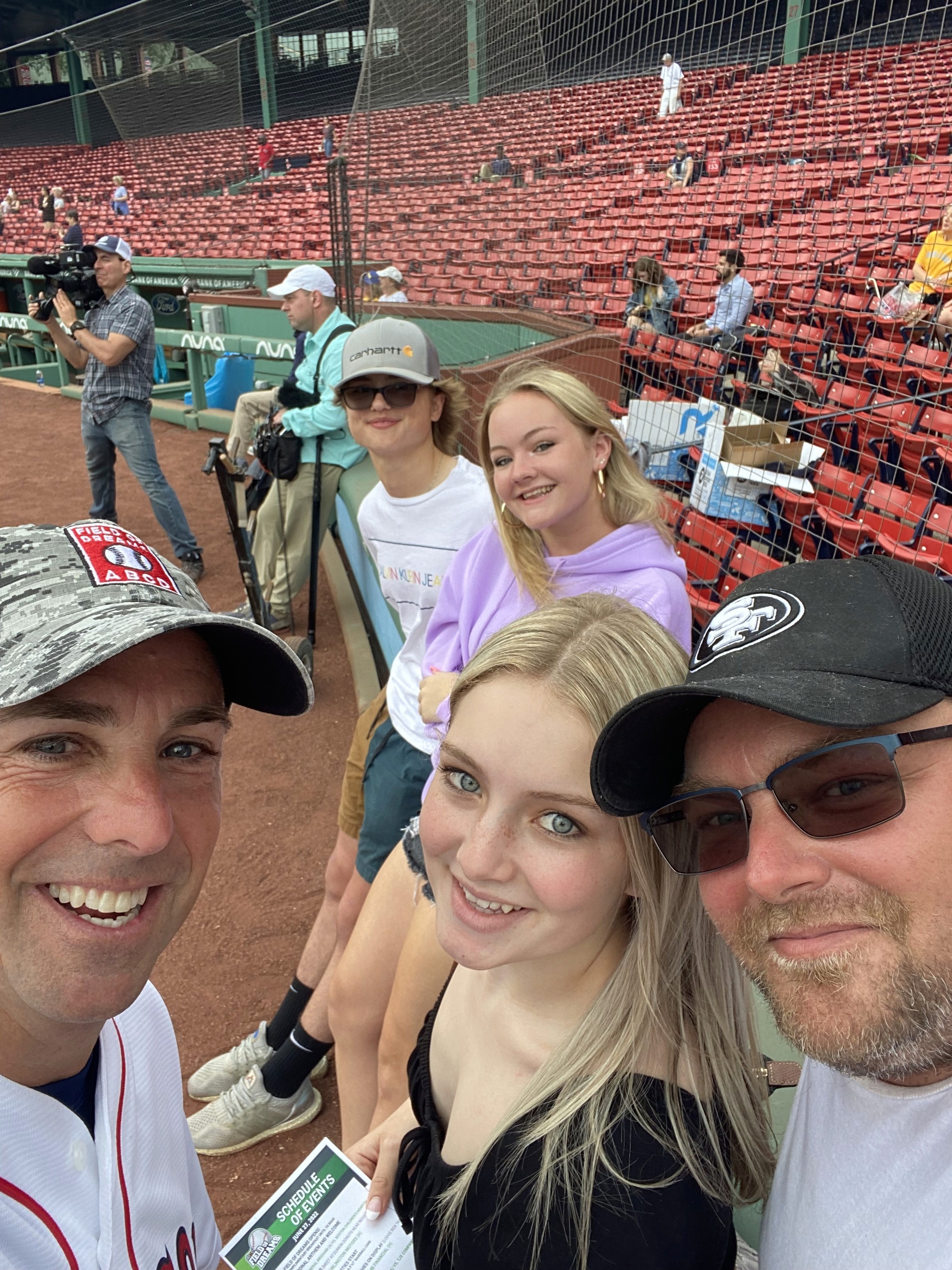 Group Taking a Selfie at a Concert Venue