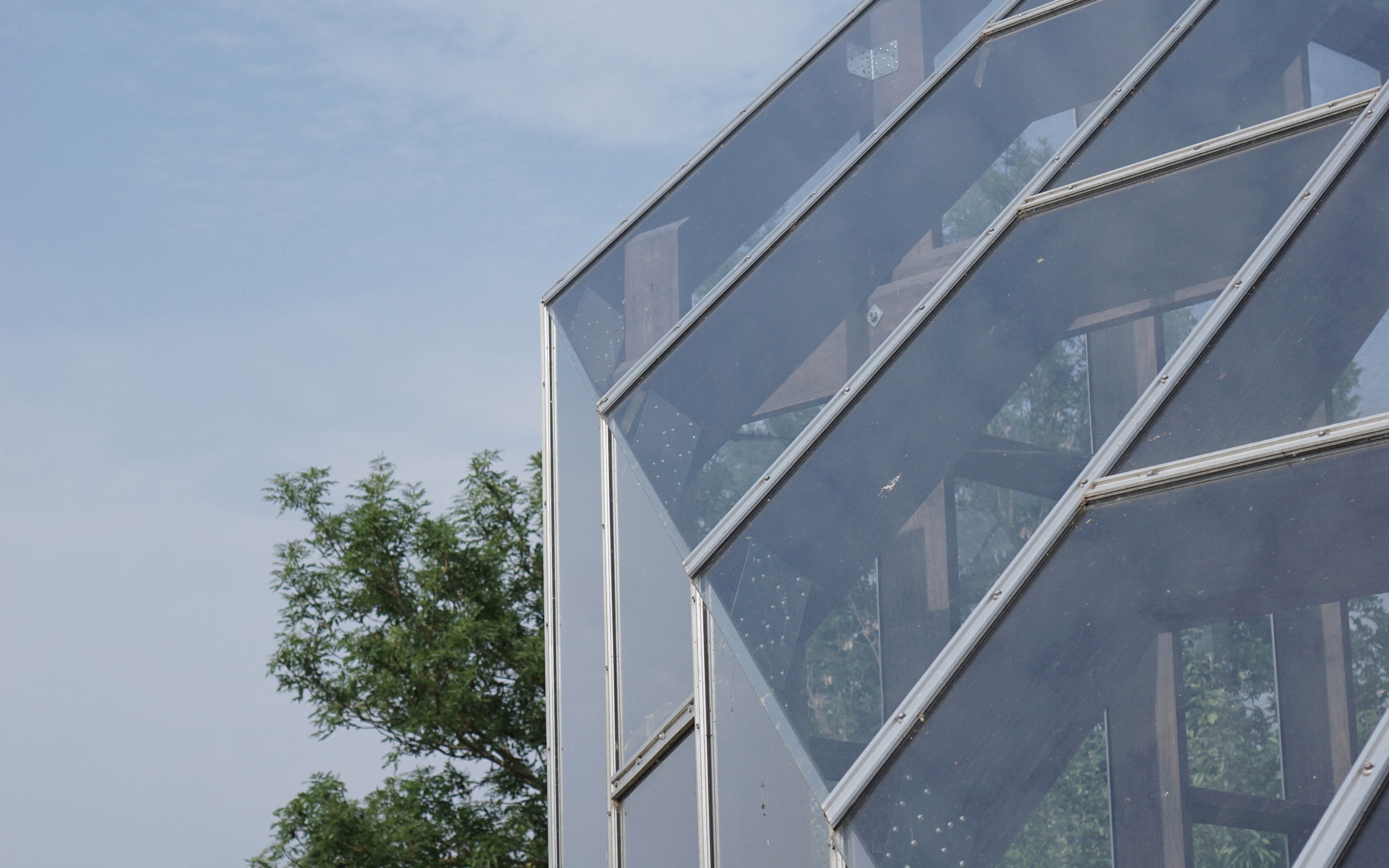 Detail of glass facade at Bakkely Orangery designed by architect Asger Risborg Jakobsen