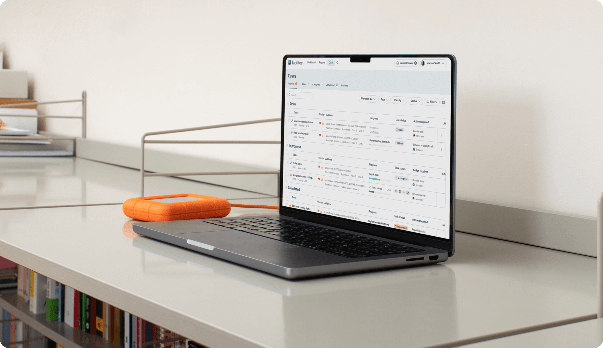 Laptop showing active cases in the Facilitee platform