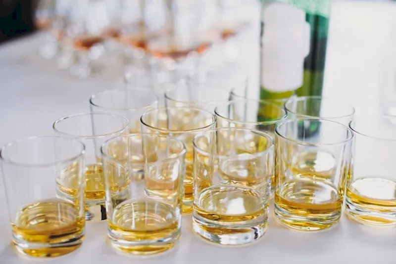 A bunch of whiskey tasting glasses