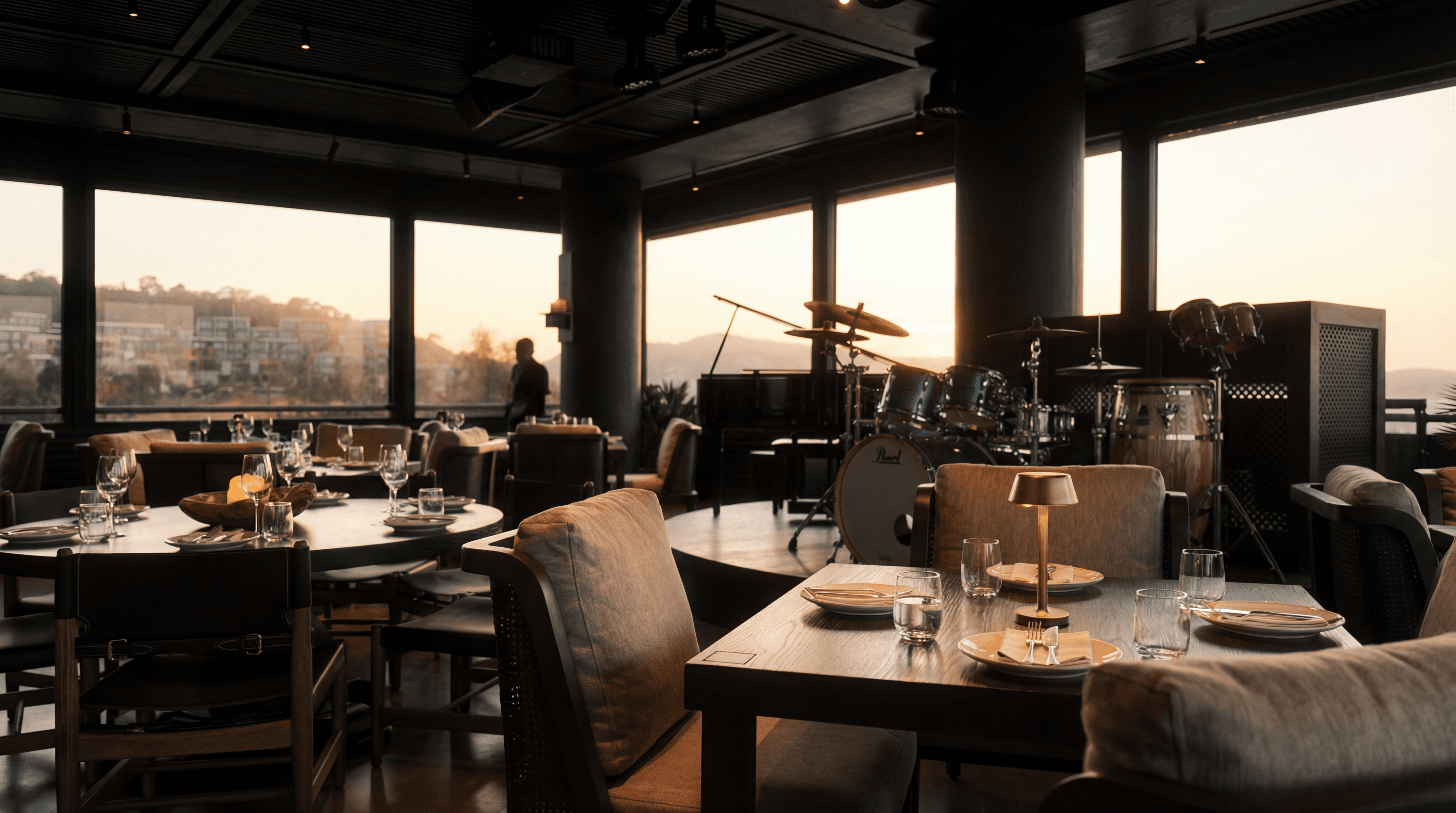 Interior of The Maine at Maxx Royal Bodrum with live music setup and evening dining atmosphere in Türkbükü