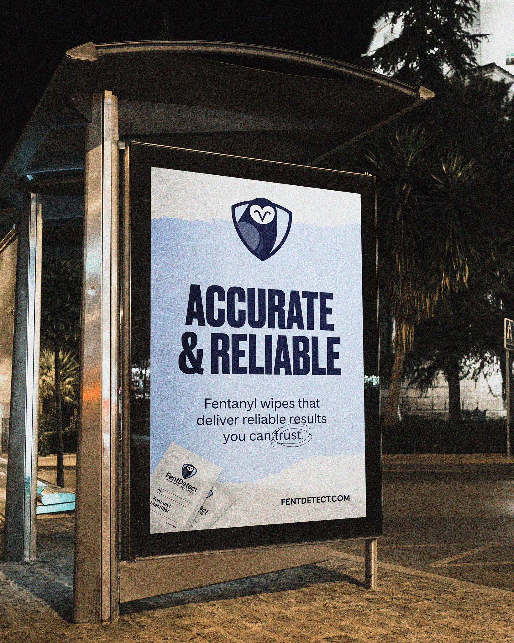 Outdoor advertising bus stop signage featuring the Fent Detect brand.