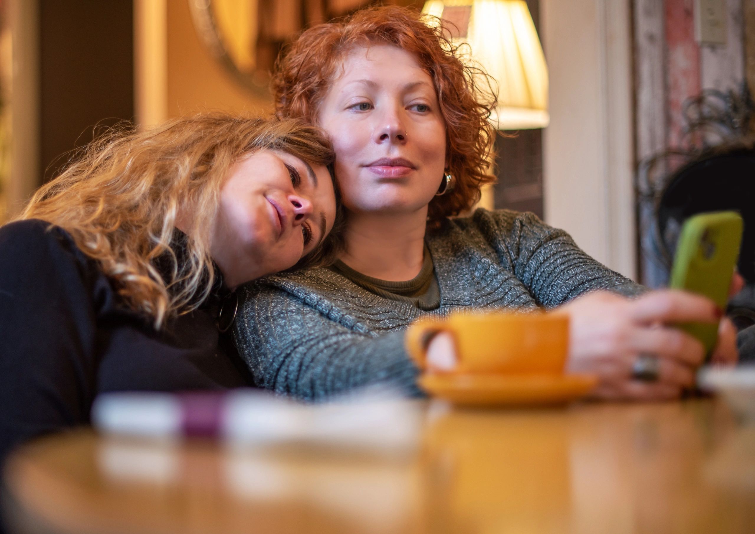 a black and white living room with a large tv