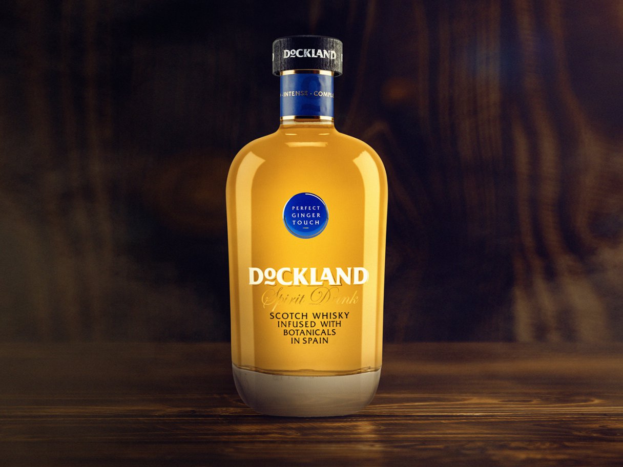 Rooftops of a coastal town with the sea in background