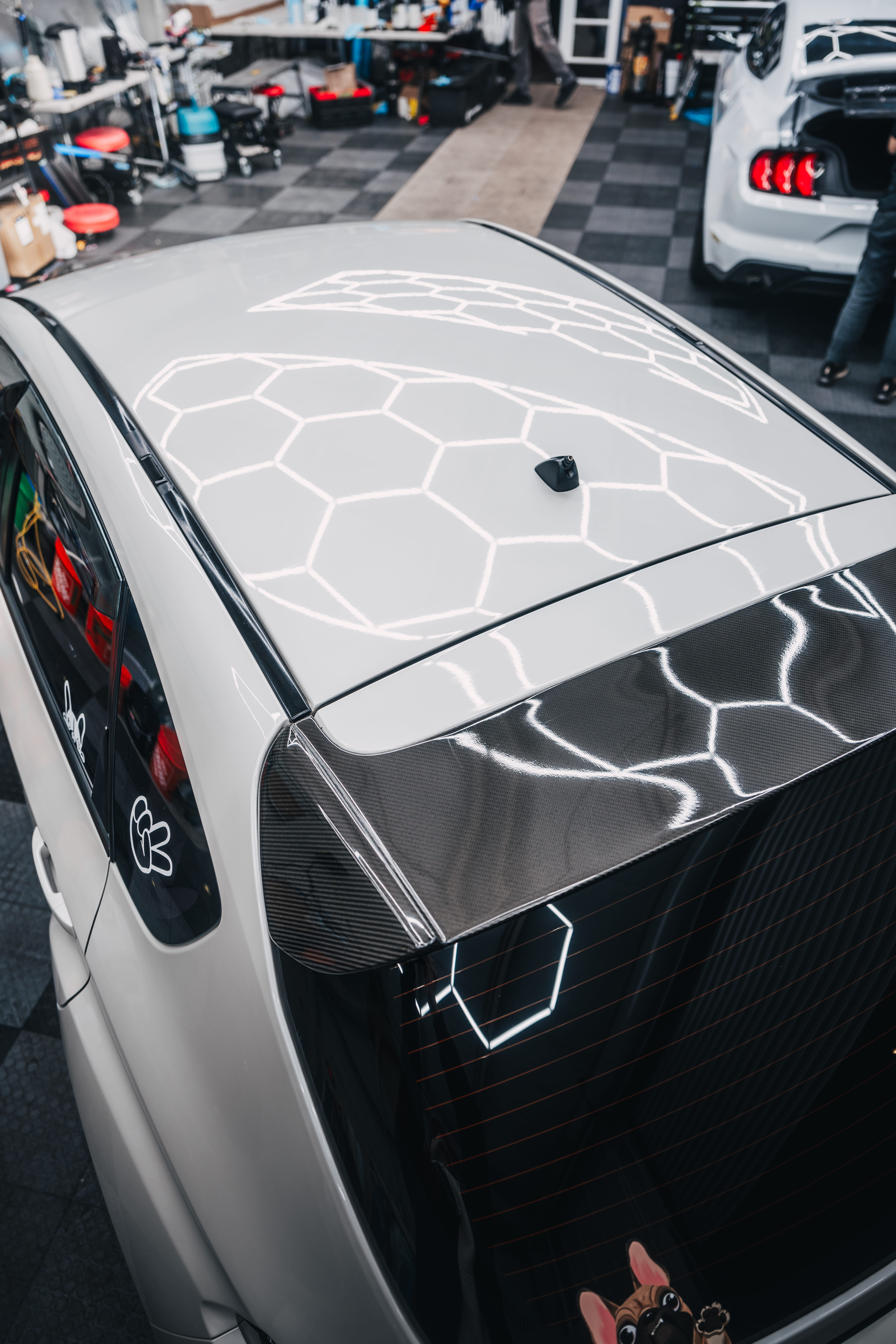 Elevated view of Icon Rocklear permanent paint protection on the roof of a white Subaru WRX Hatch, Dragon Auto Milpitas