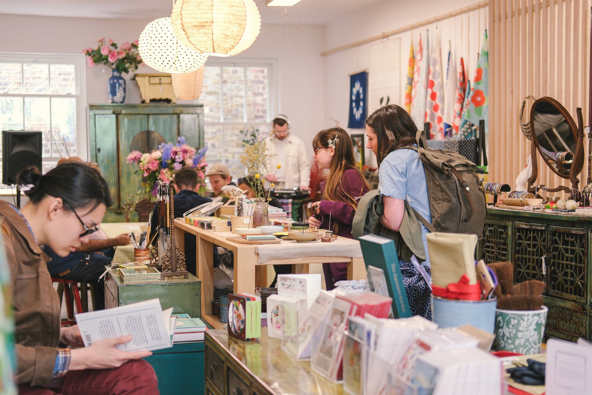 Customers browse Chinese home decor in London-based shop, Rouge Shop London