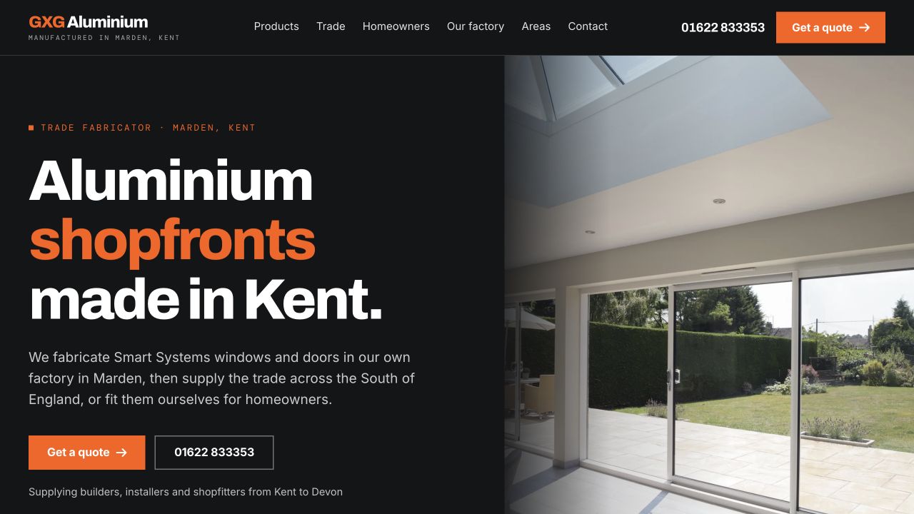 The finished GXG Aluminium homepage, with orange typography and architectural glazing photography
