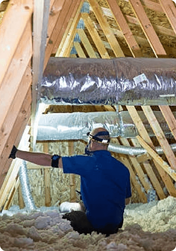 A diverse team collaborates around a table, analyzing documents and charts in a professional setting with a light green background.