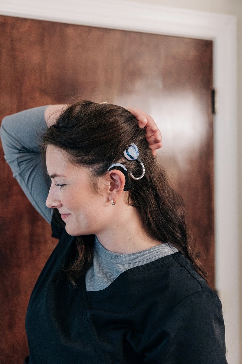 Courtney Parker wearing hearing aids