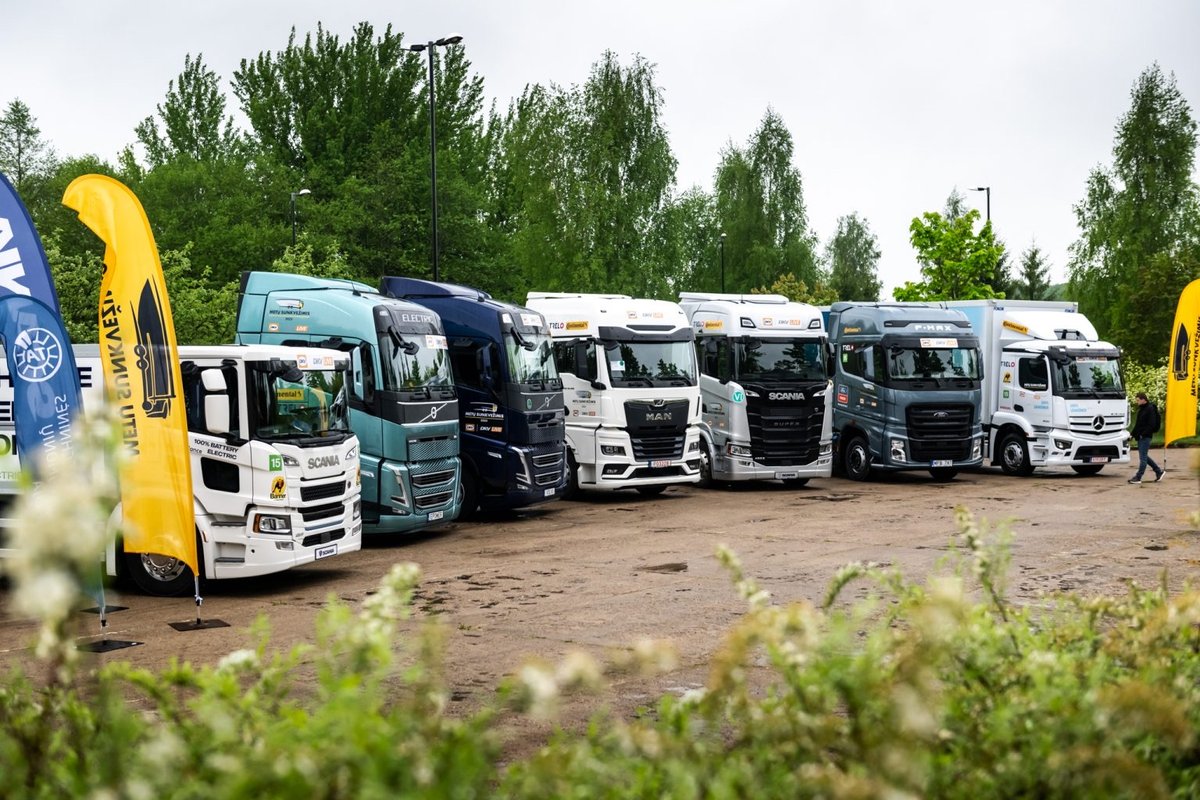 A row of trucks from various manufacturers implicated in the cartel case, illustrating the breadth of the price-fixing impact.