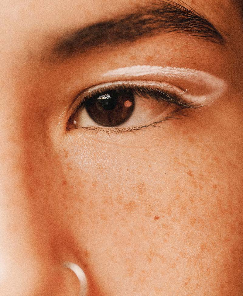 woman in white long sleeve shirt