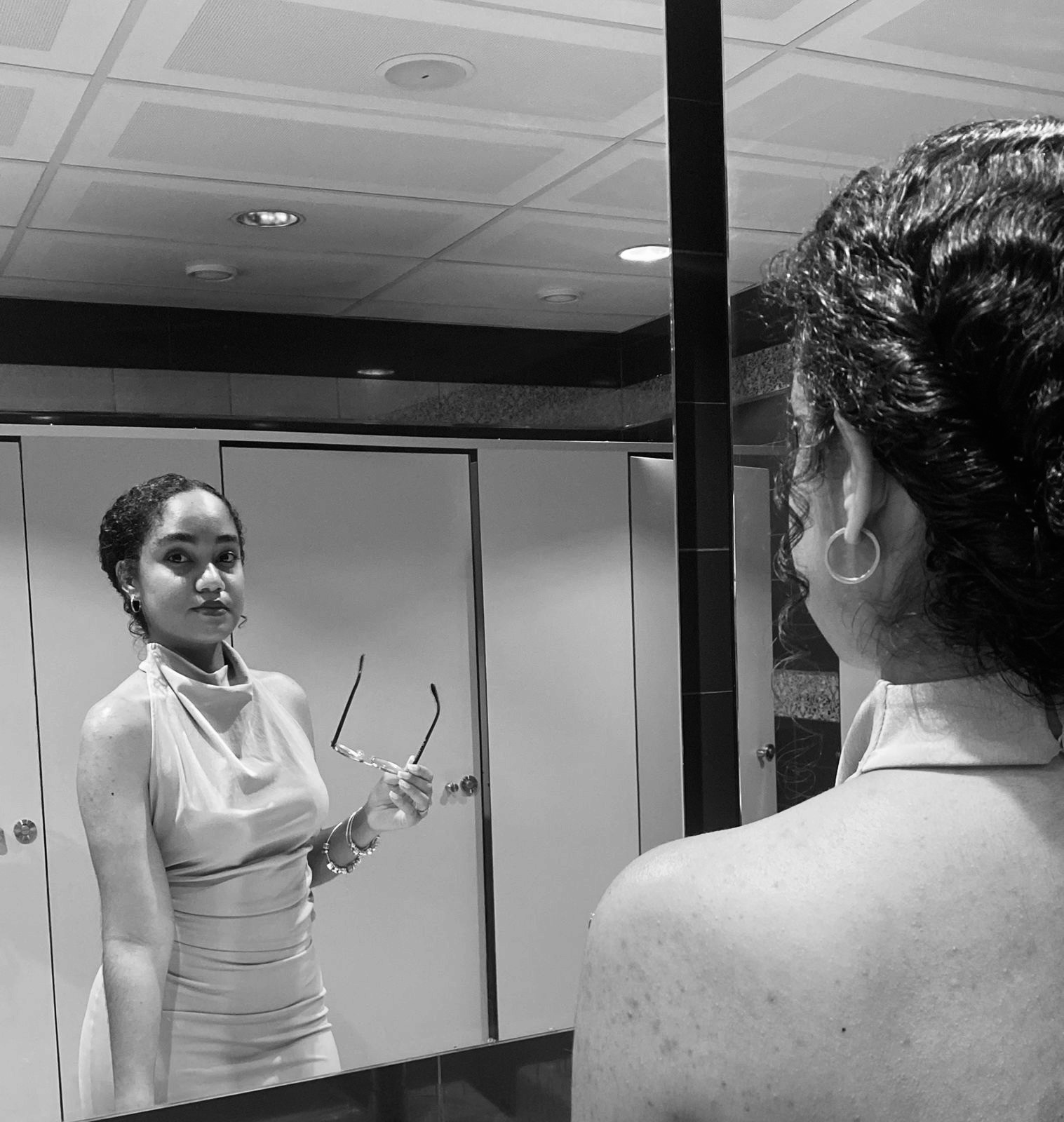 woman in white crew neck shirt smiling