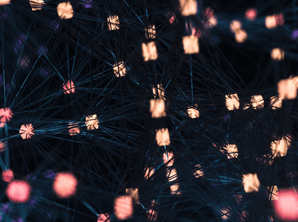Abstract visualization of a digital network with glowing nodes and connecting lines, representing health industry software systems and data connectivity.
