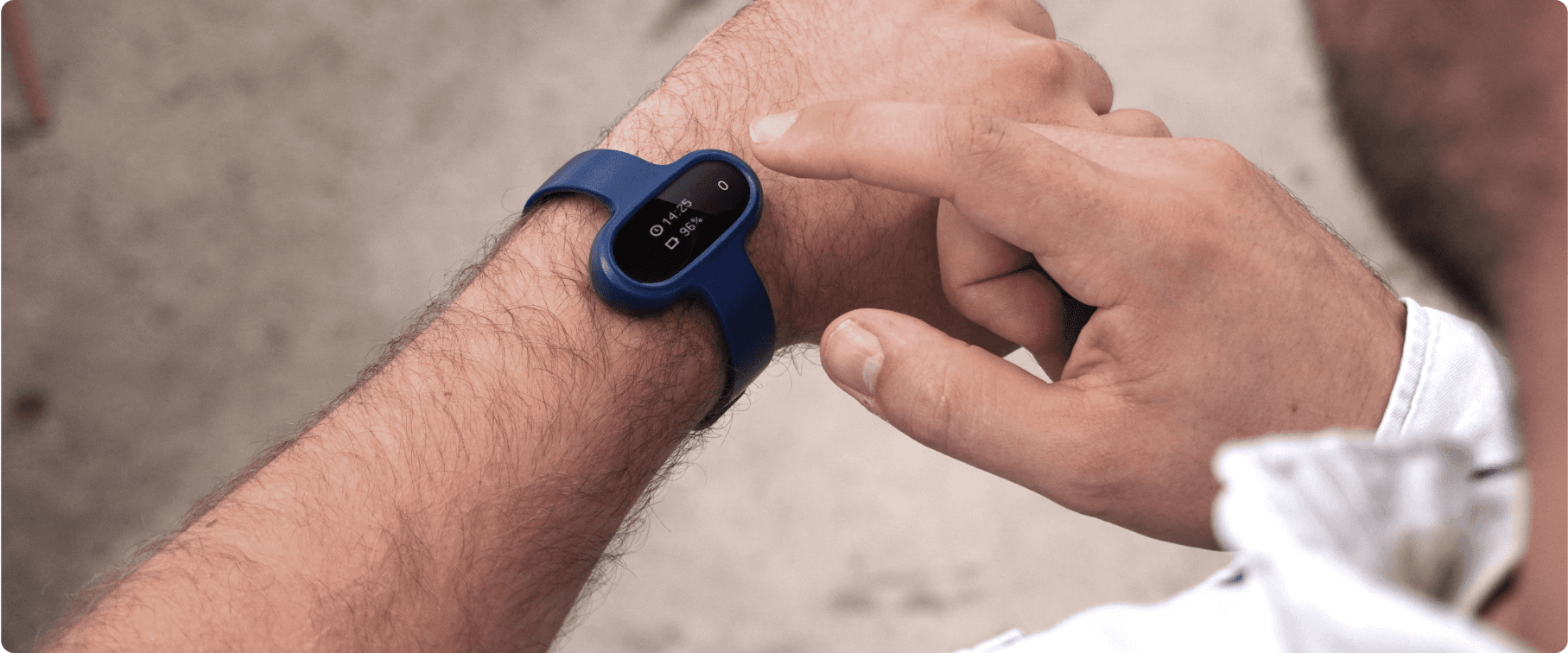 Wearable GPS tracker designed for a person's wrist, offering a compact, secure fit with real-time location tracking for safety and navigation purposes.