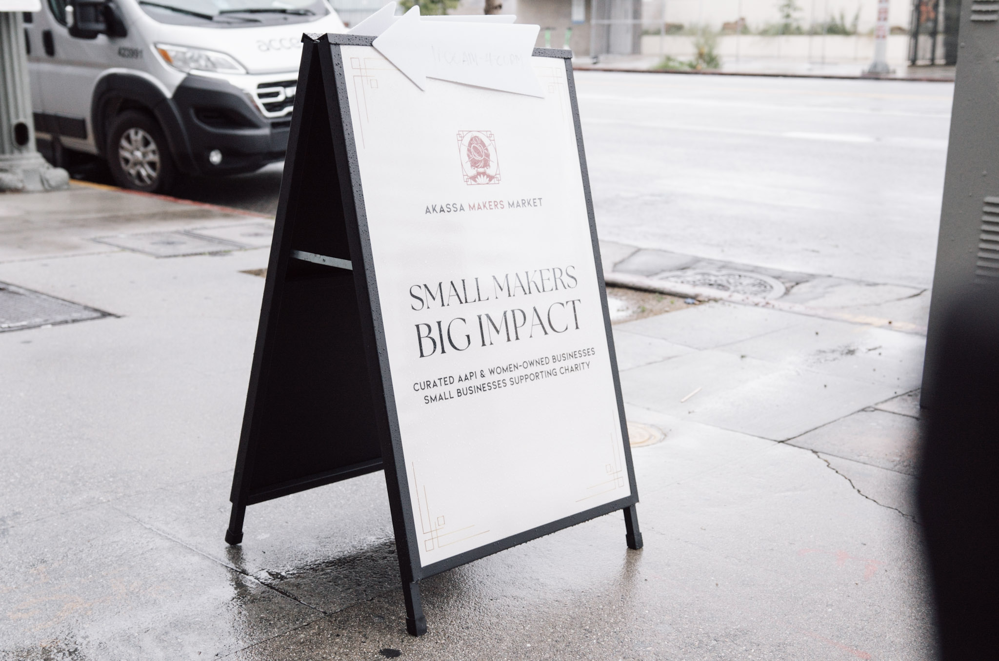 Red-orange delivery bag with white text 'Bringing Flavour to Your Door' and the brand name 'delivo