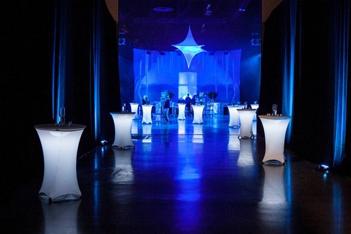 Sophisticated lighting and sound system creating a professional, high-class atmosphere at a corporate gala.