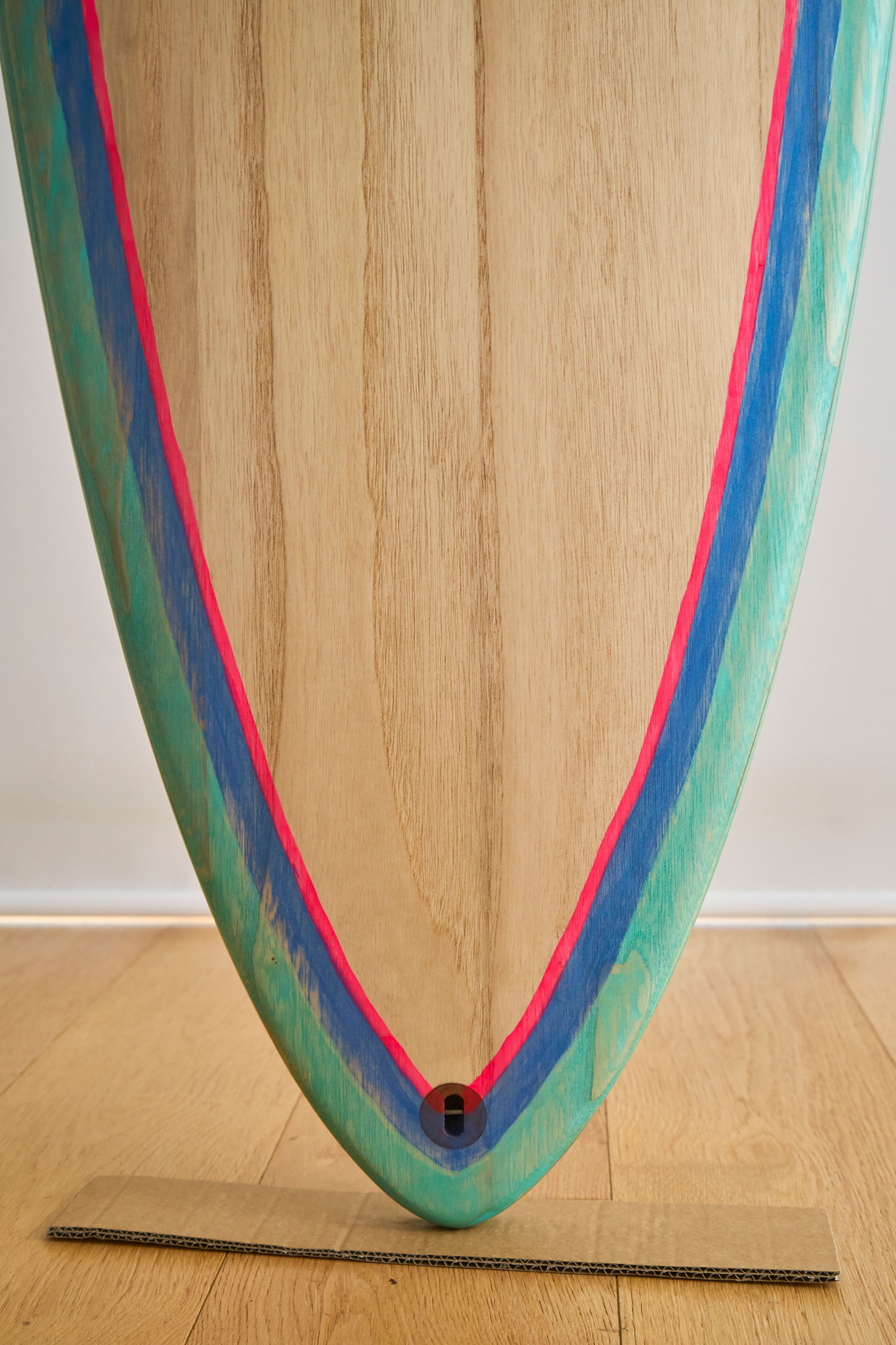 Pin tail mid length wooden surfboard