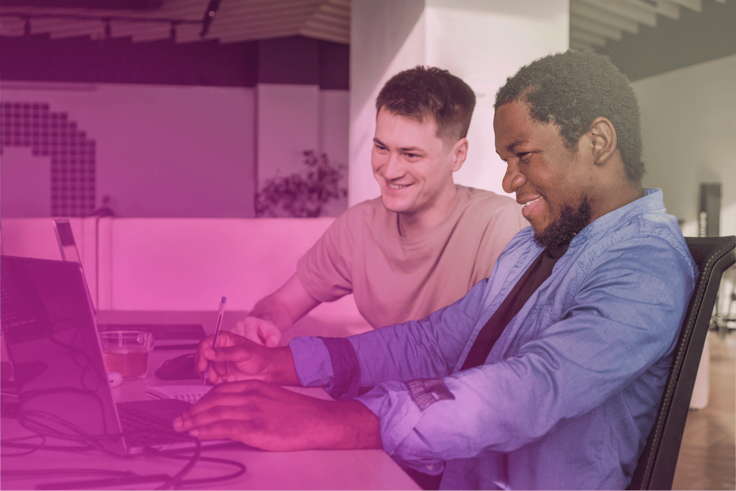 Image featuring a greyscaled website on an abstract background.