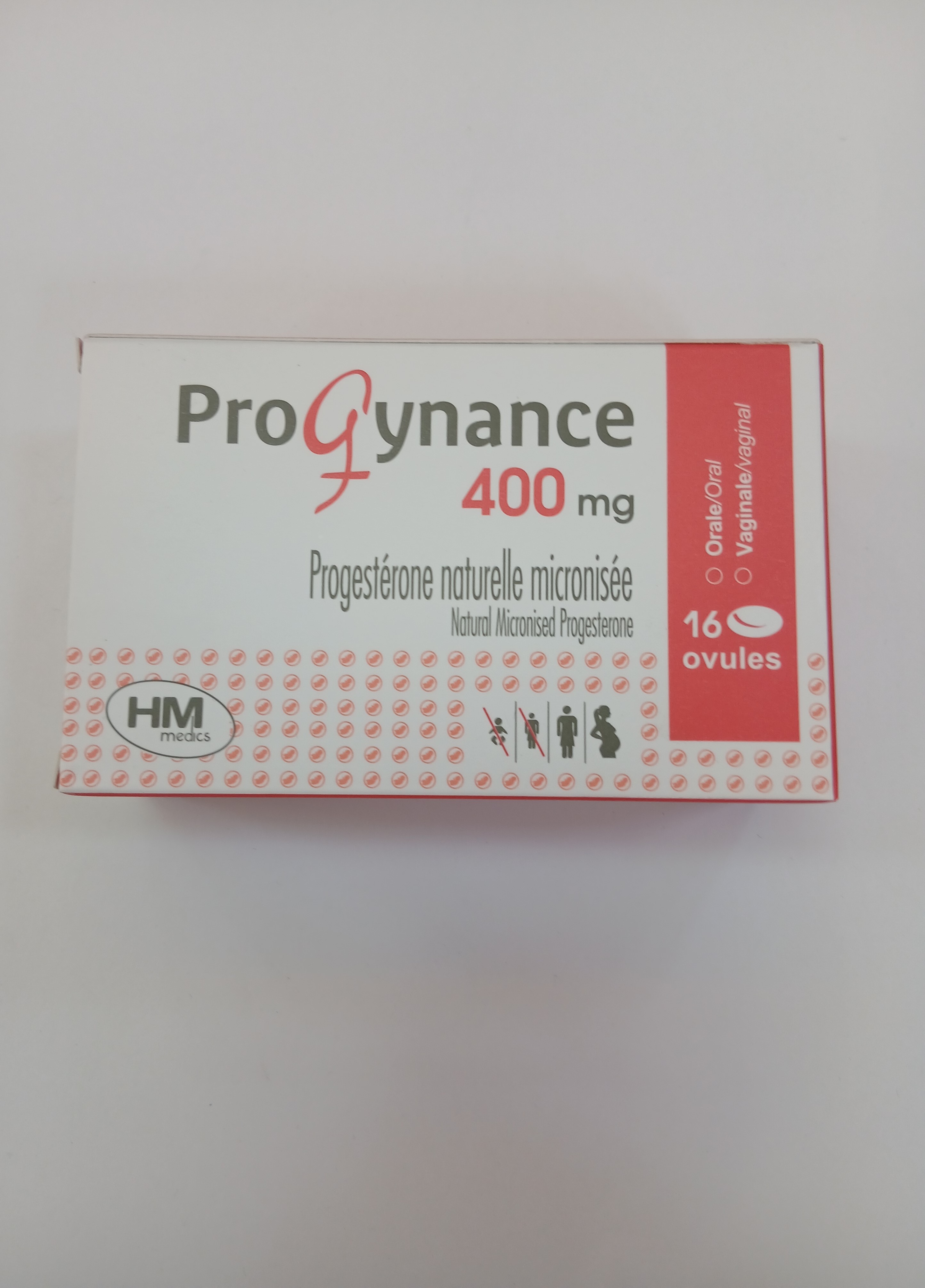 White and red cardboard packaging with a blister strip containing 16 oval-shaped, white pills arranged inside clear plastic compartments.