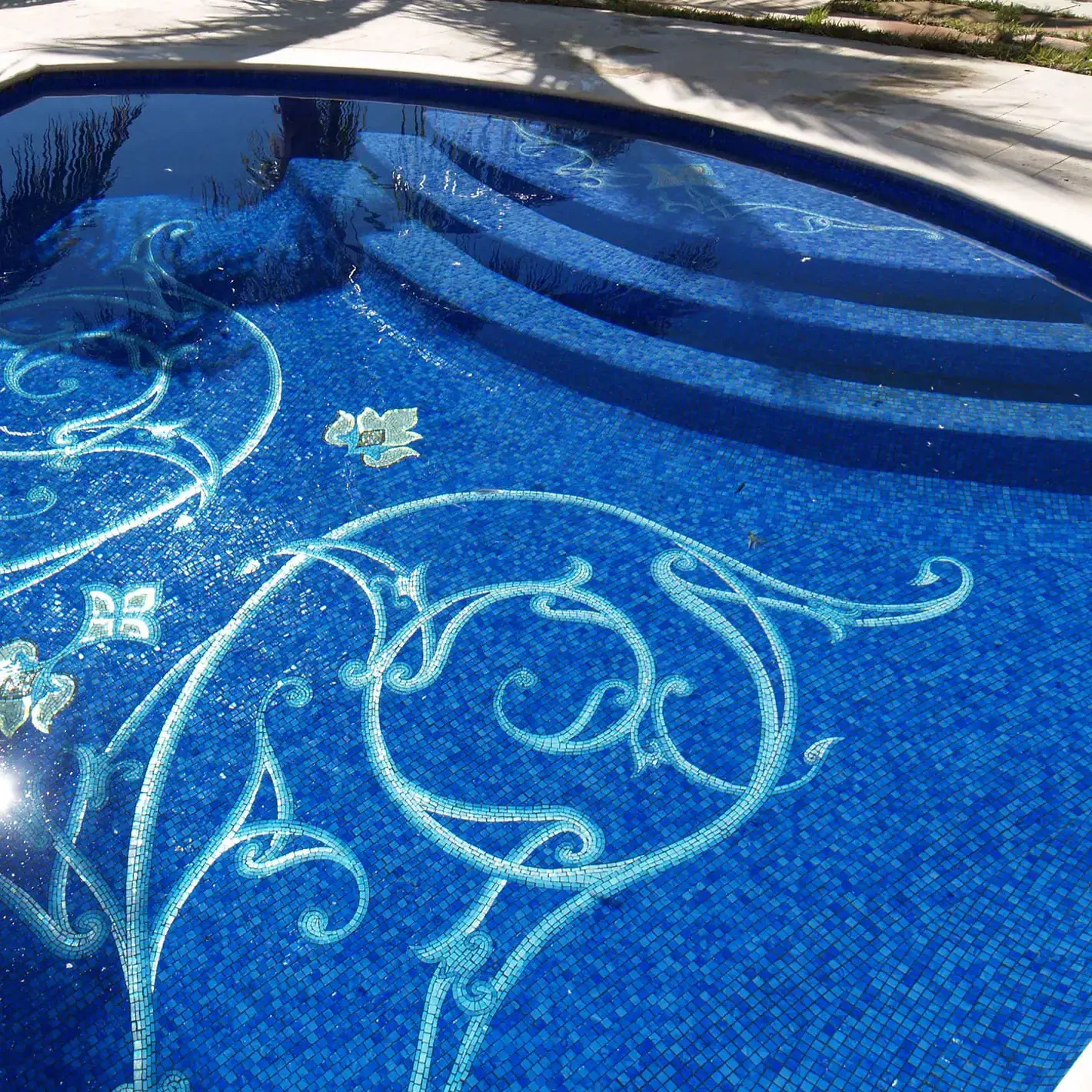 Elegant Mosaic Glass Pool Design on Naples Bay.