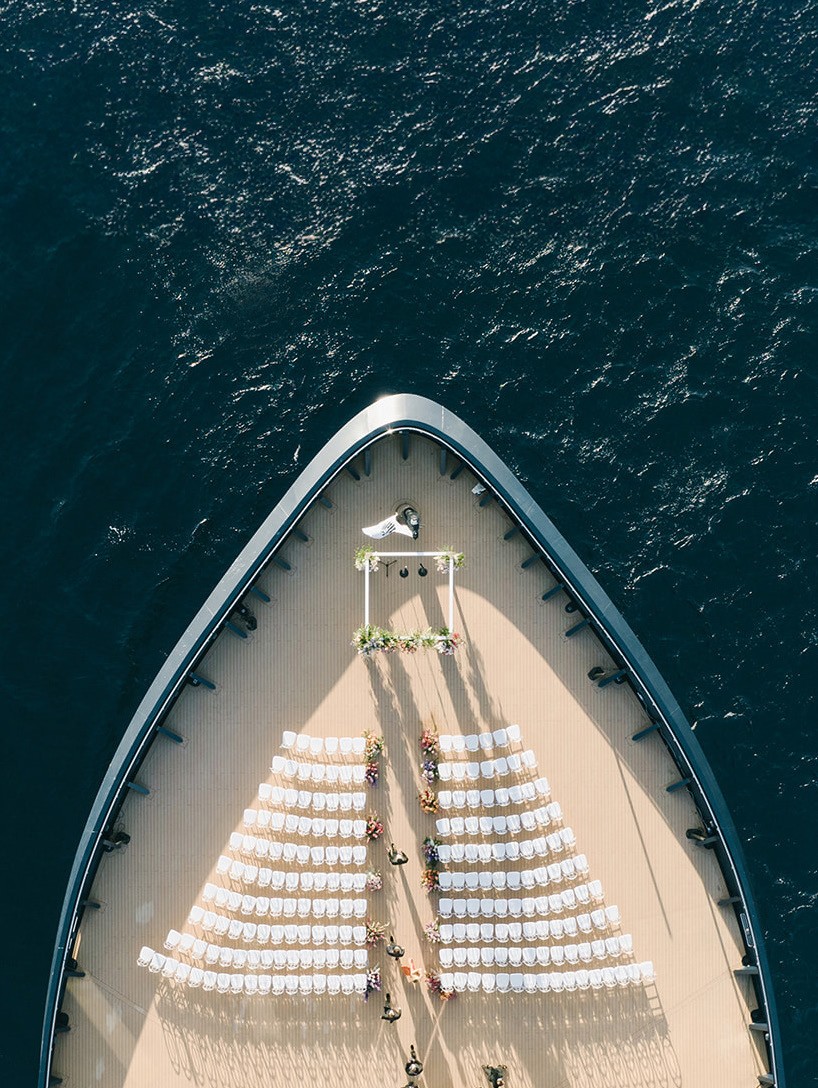 A wedding ceremony arranged on the bow deck of a Ritz-Carlton yacht