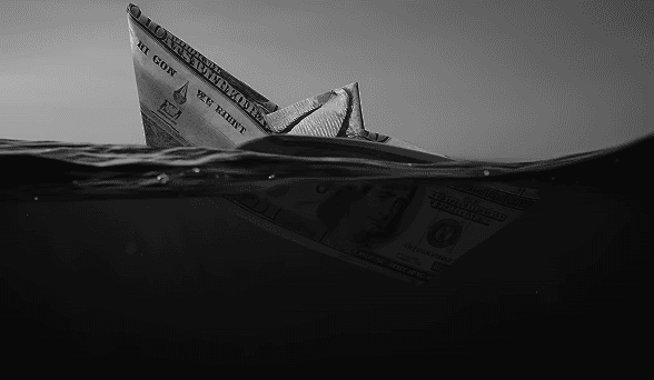 a black and white living room with a large tv