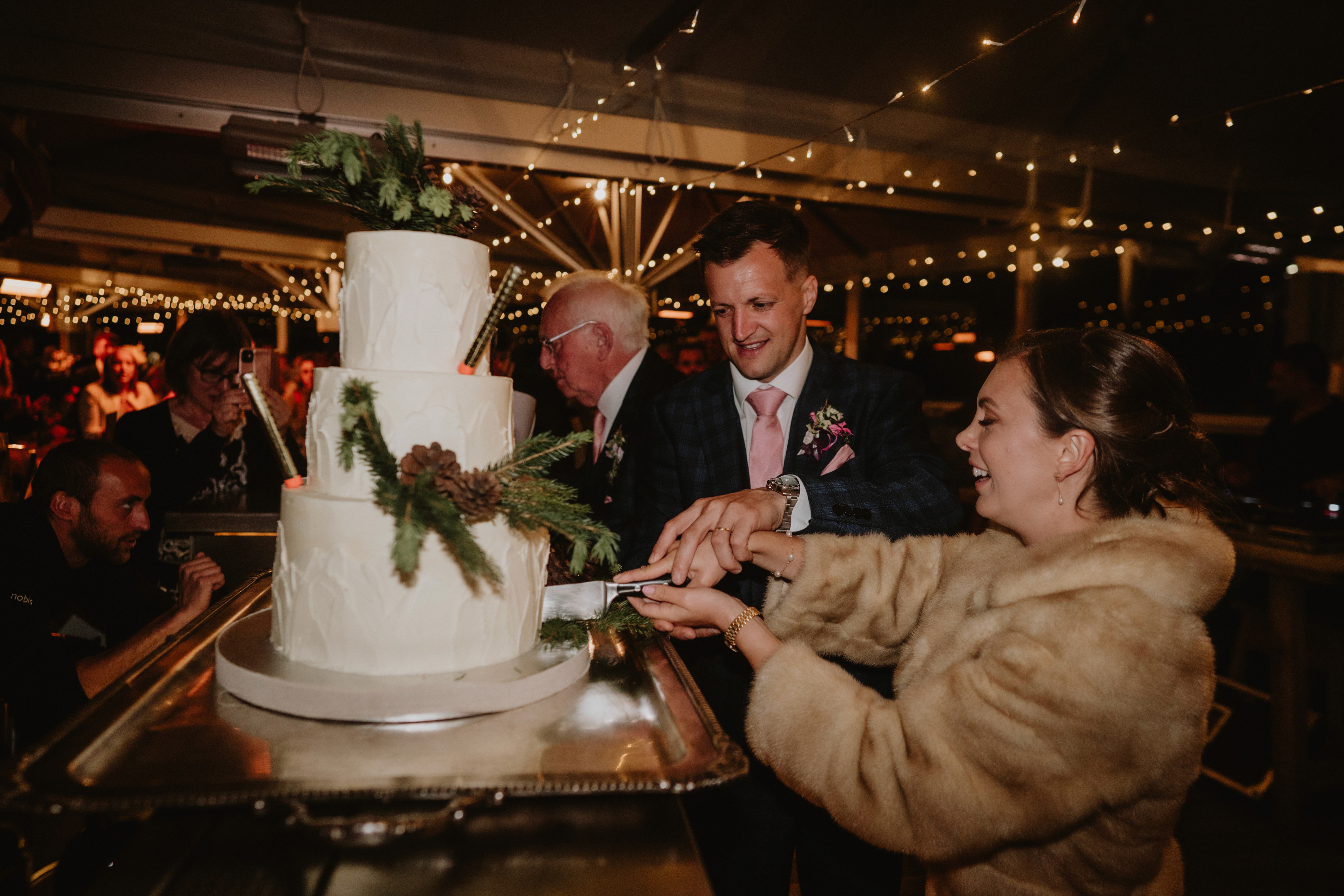 Afterparty cutting a cake