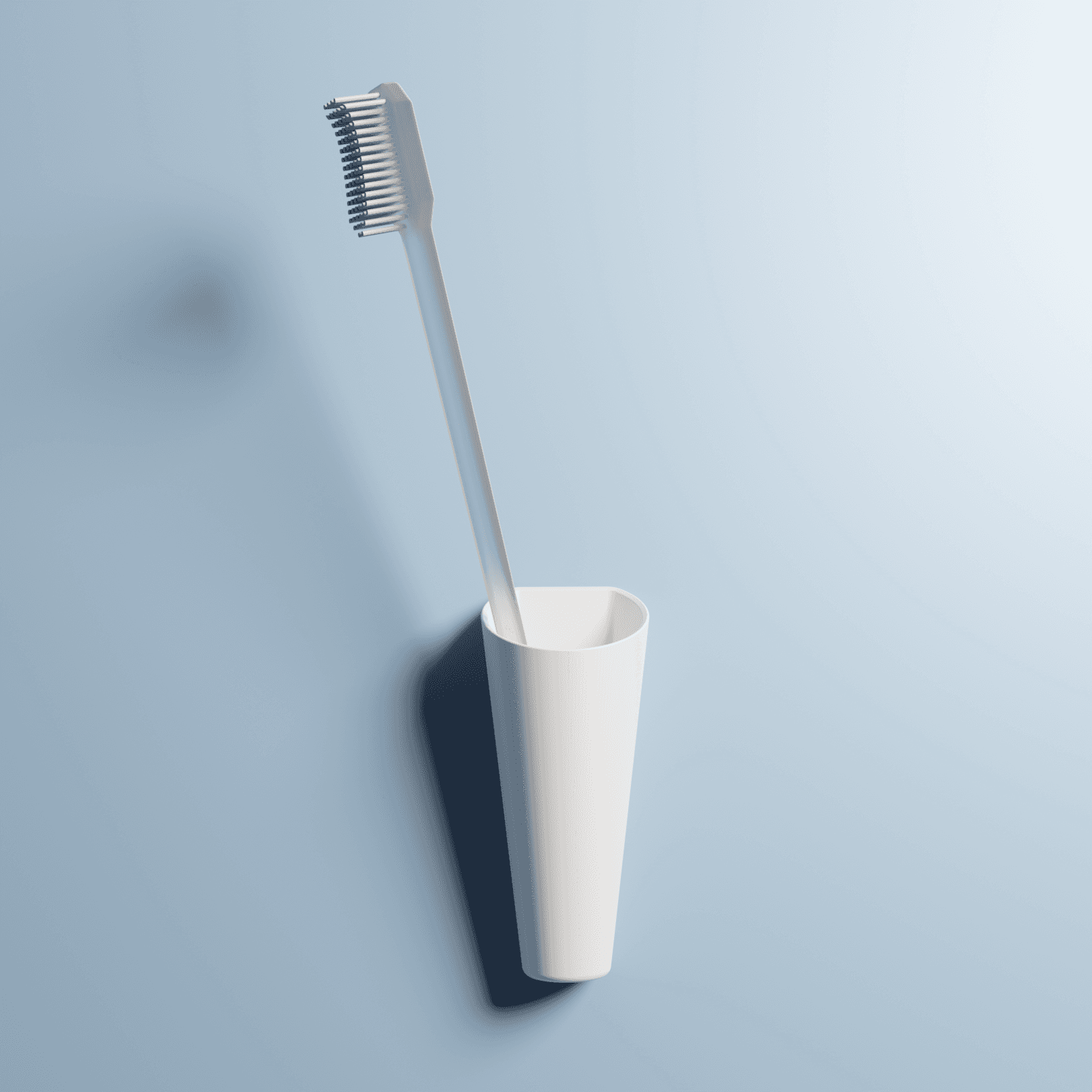 A sleek, cone-shaped white wall-mounted toothbrush holder. This minimalist design is an example of a simple, practical product developed with attention to detail and ease of installation.