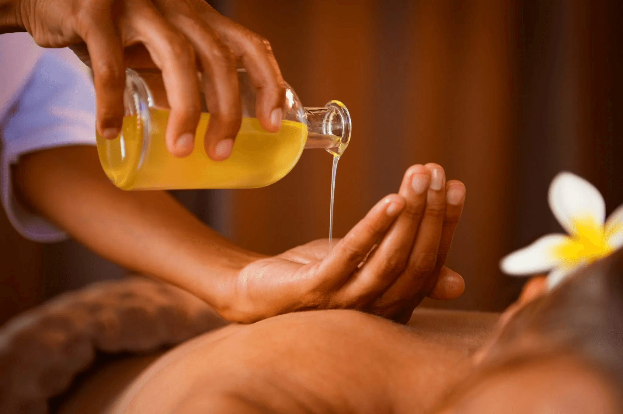 A luxurious indoor pool area with a panoramic view of a city at sunset. Comfortable lounge beds with soft fabrics surround the pool, while warm ambient lighting enhances the sophisticated atmosphere. The space combines modern elegance with a tranquil vibe.