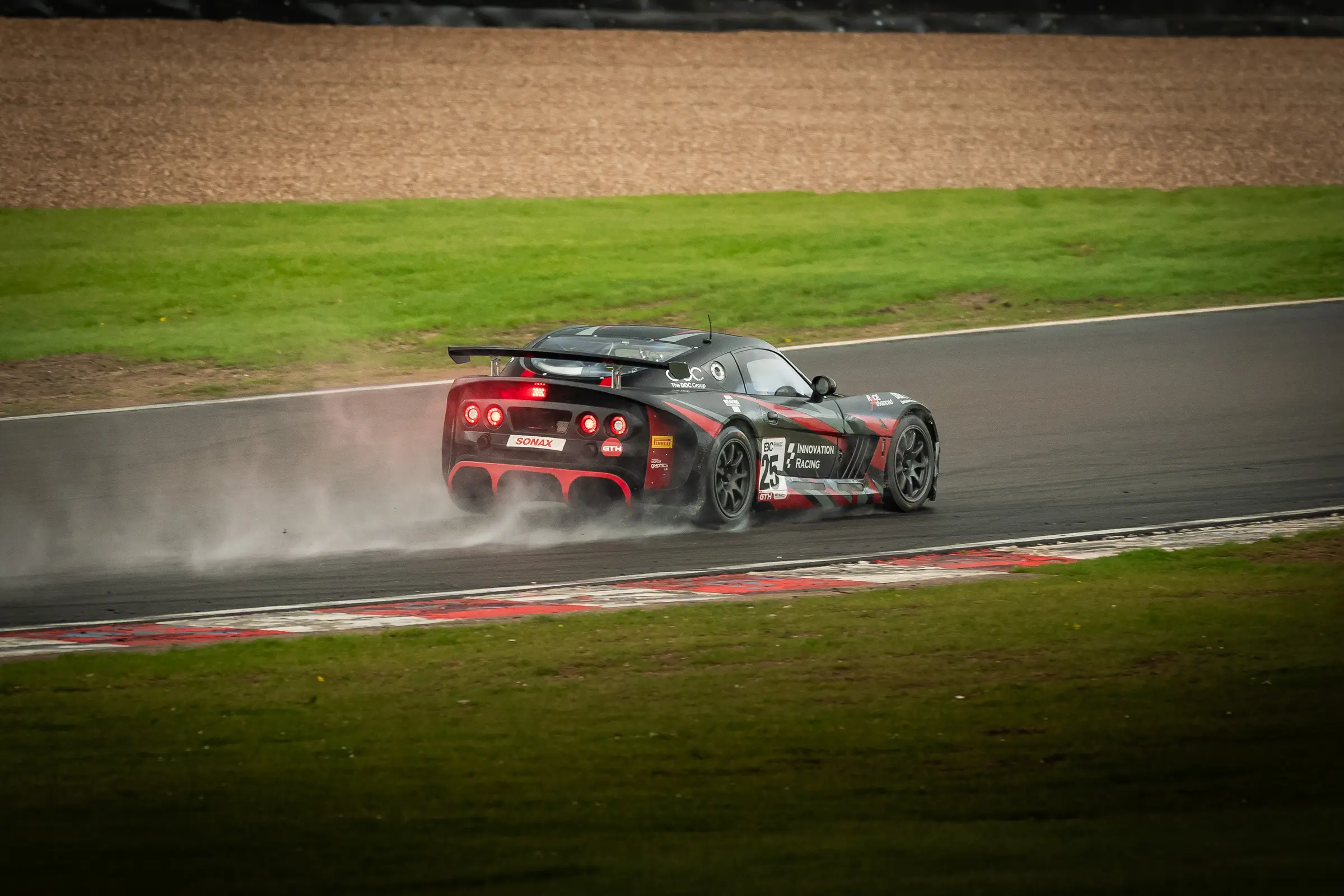 GT Racing team in the wet at DDonington Park on photo