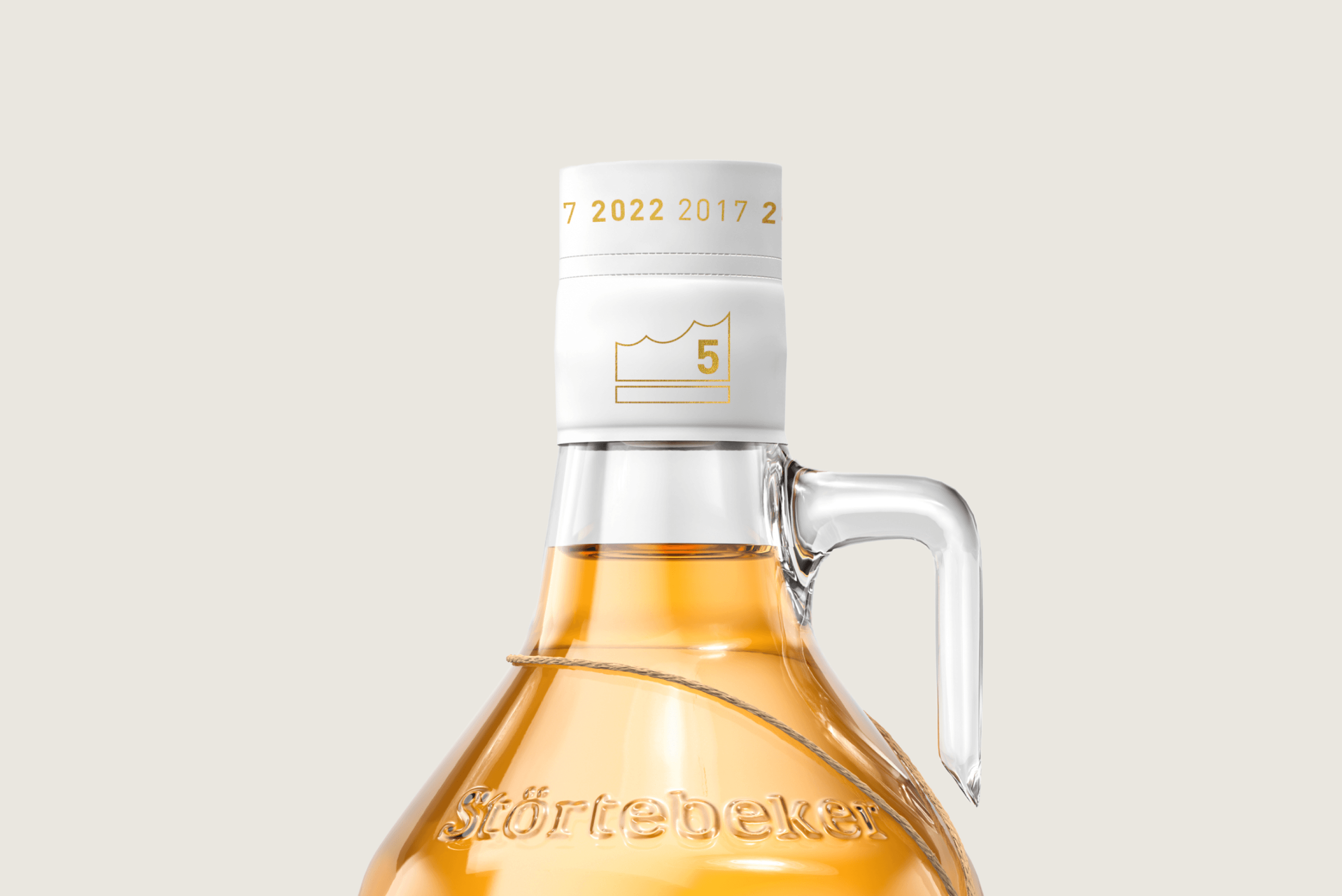 Störtebeker bottle with gold accents and dates