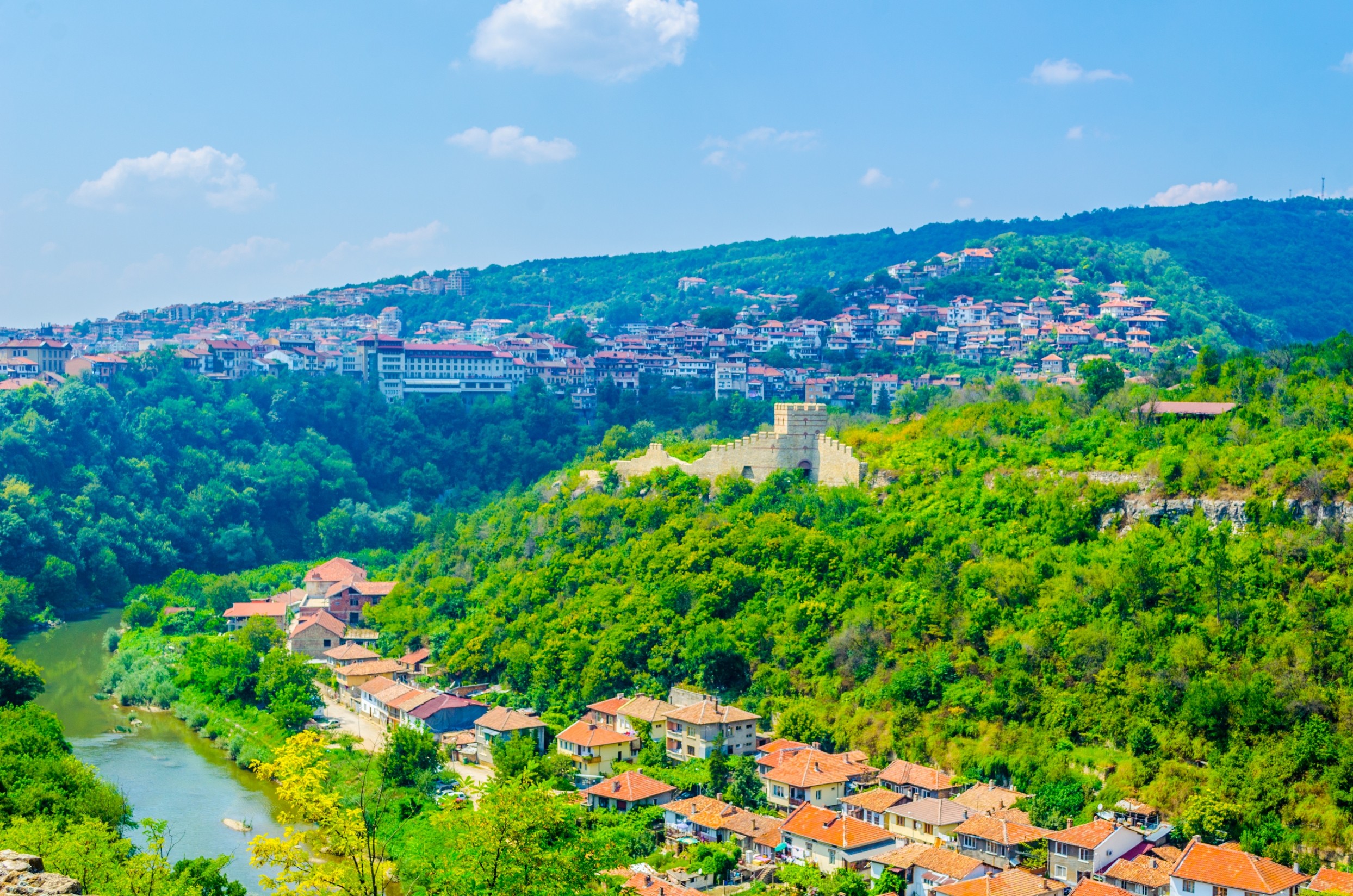 Group of men standing with Sufboard