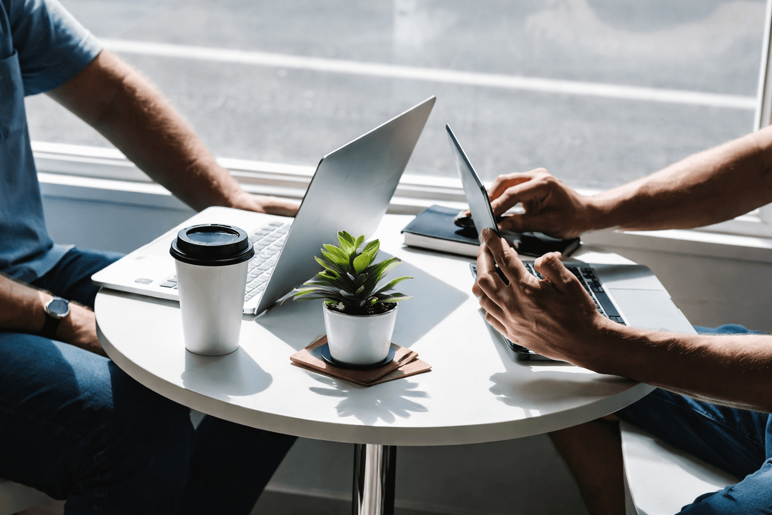 people sitting on chair in front of laptop computers