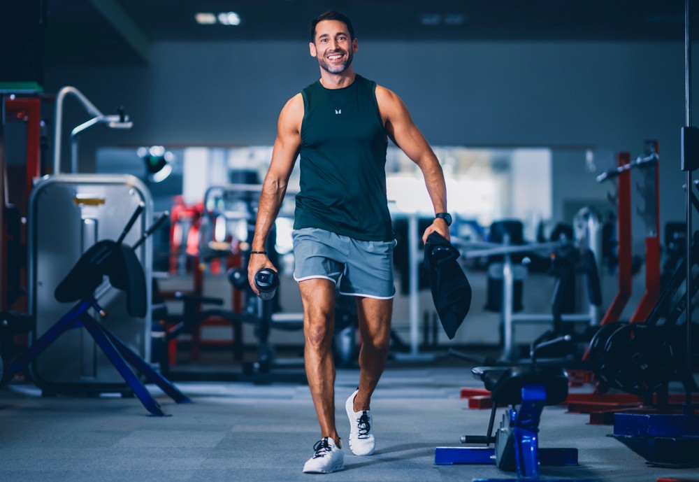 Drone shot of a running track at night