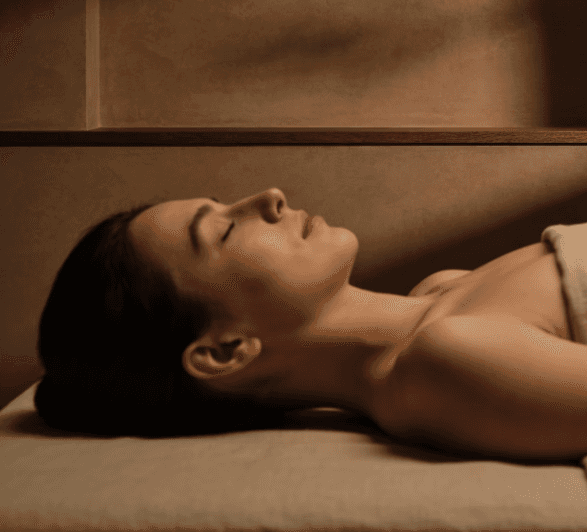 Person relaxing during somatic healing and nervous system reset session