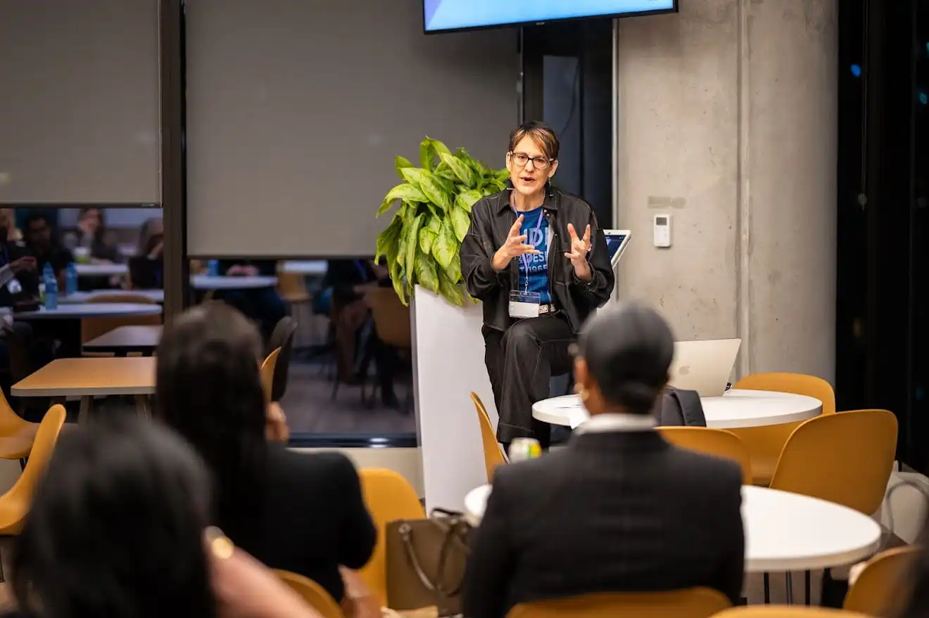 Daneal talking to their students