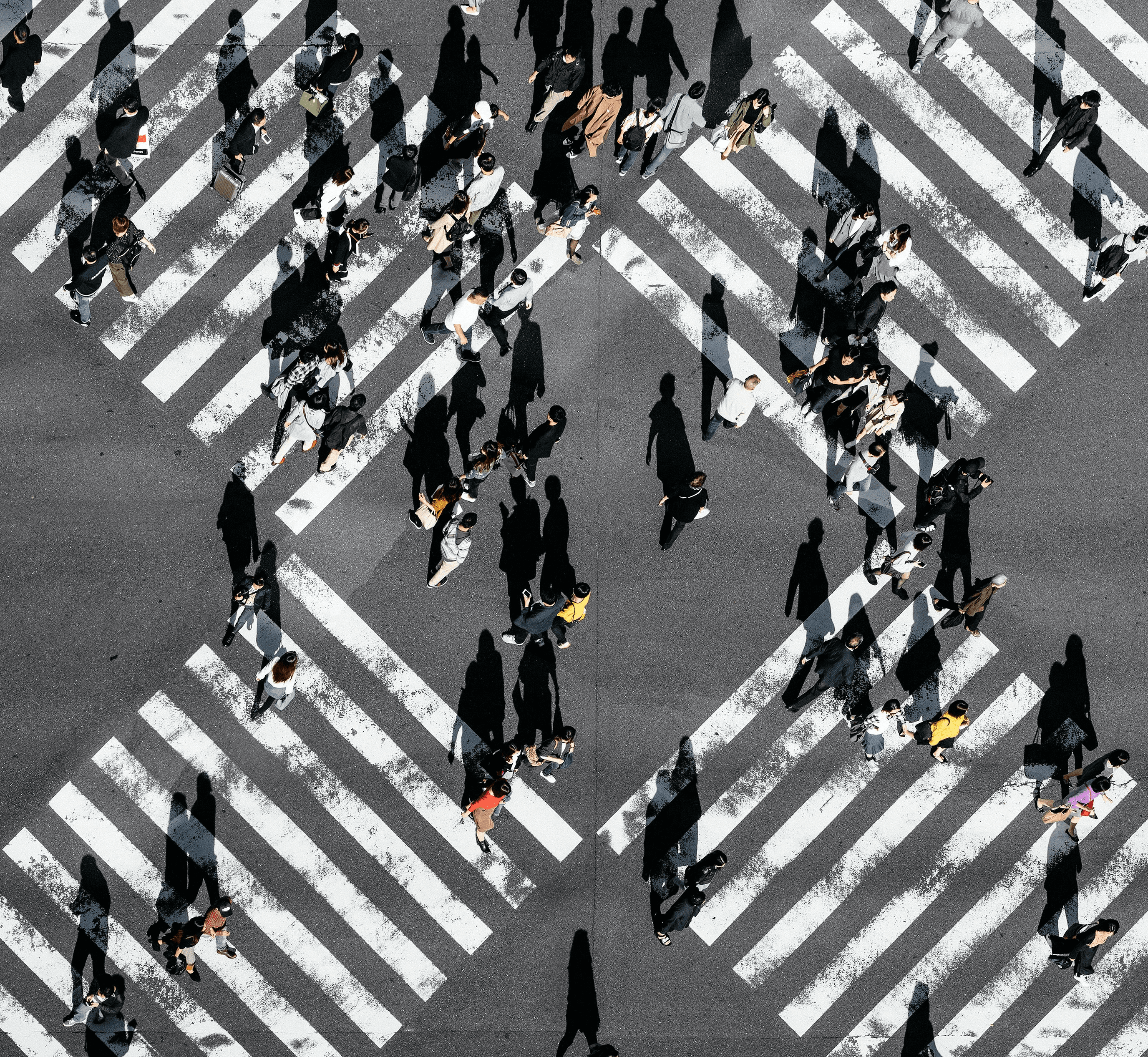 An aerial view of people crossing the steet in Tokyo, Japan