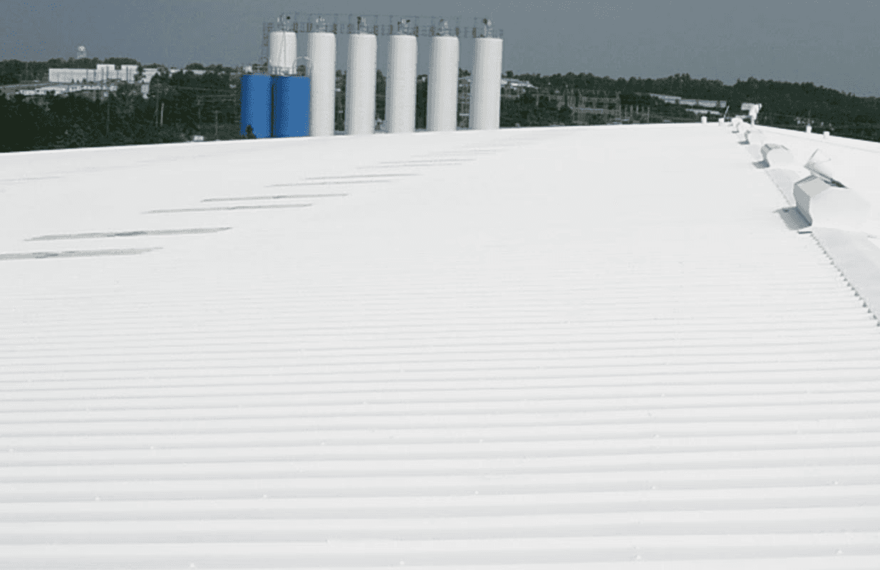 After a high solids silicone coating on a metal roof.
