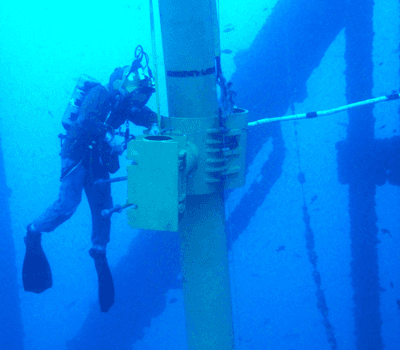 photography of two persons underwater
