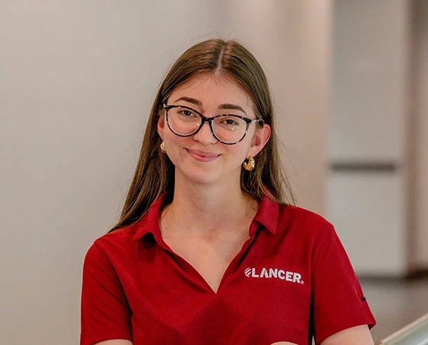 young man holding shovel in farm