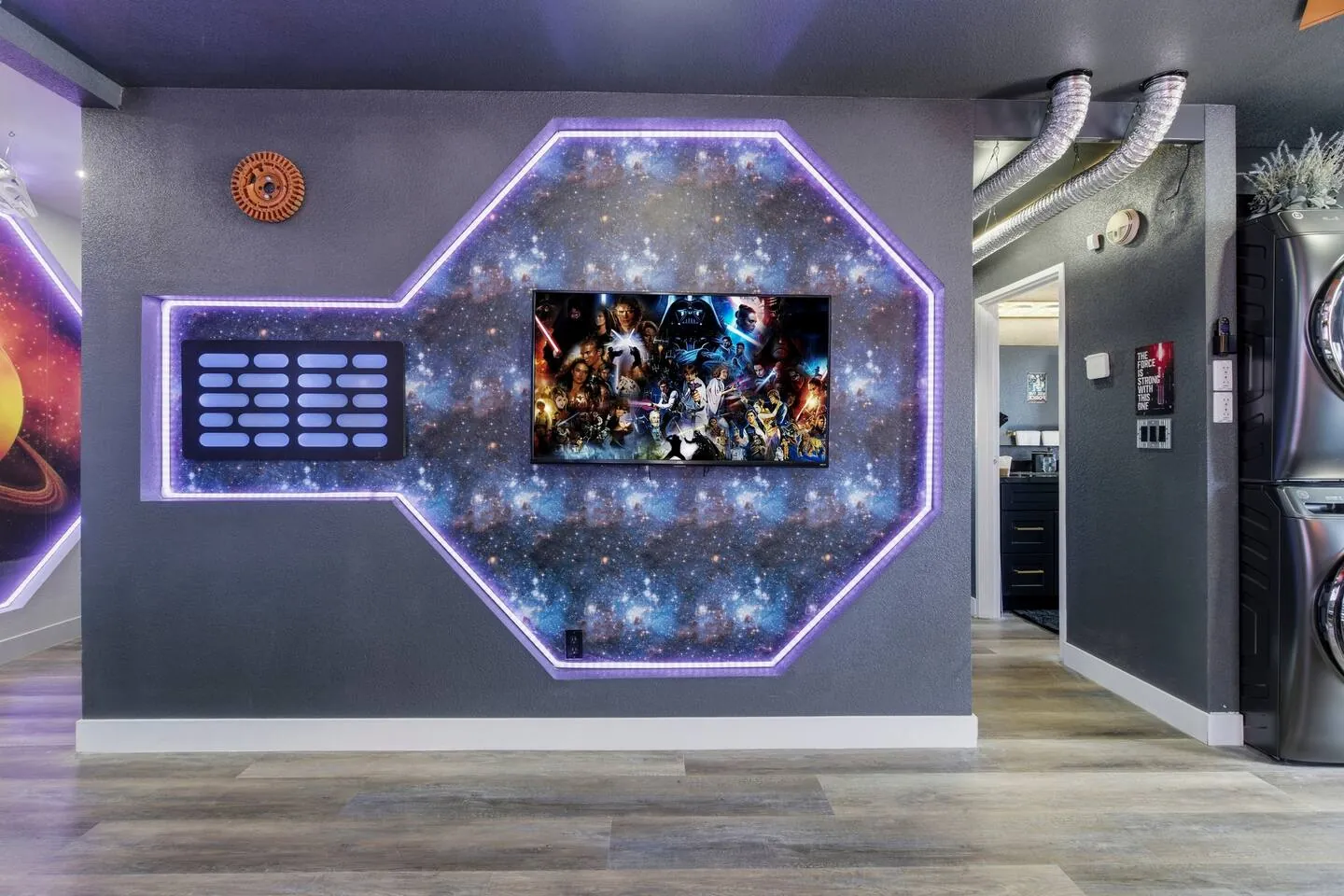 Galaxy wall display around the TV, Star Wars Getaway in North Las Vegas