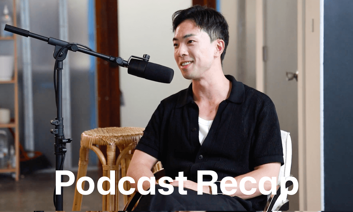 Man speaking into a podcast microphone during an interview session.
