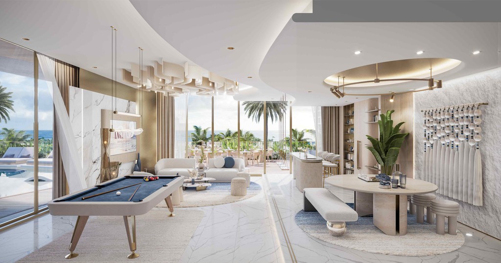 Contemporary living room with a pool table and dining table, located in the Sunset Bay Grand.