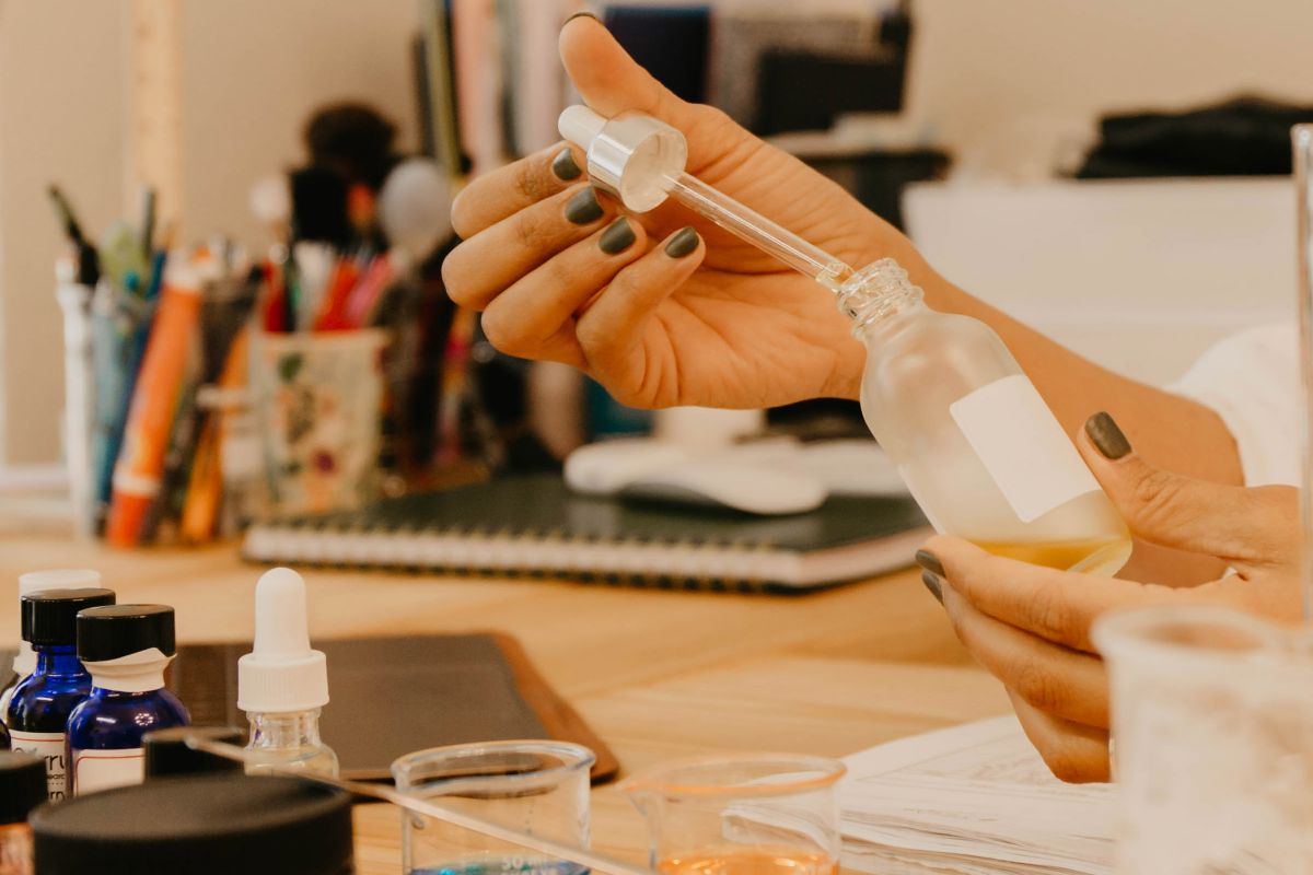 clean beauty lab team developing skincare formulation in laboratory