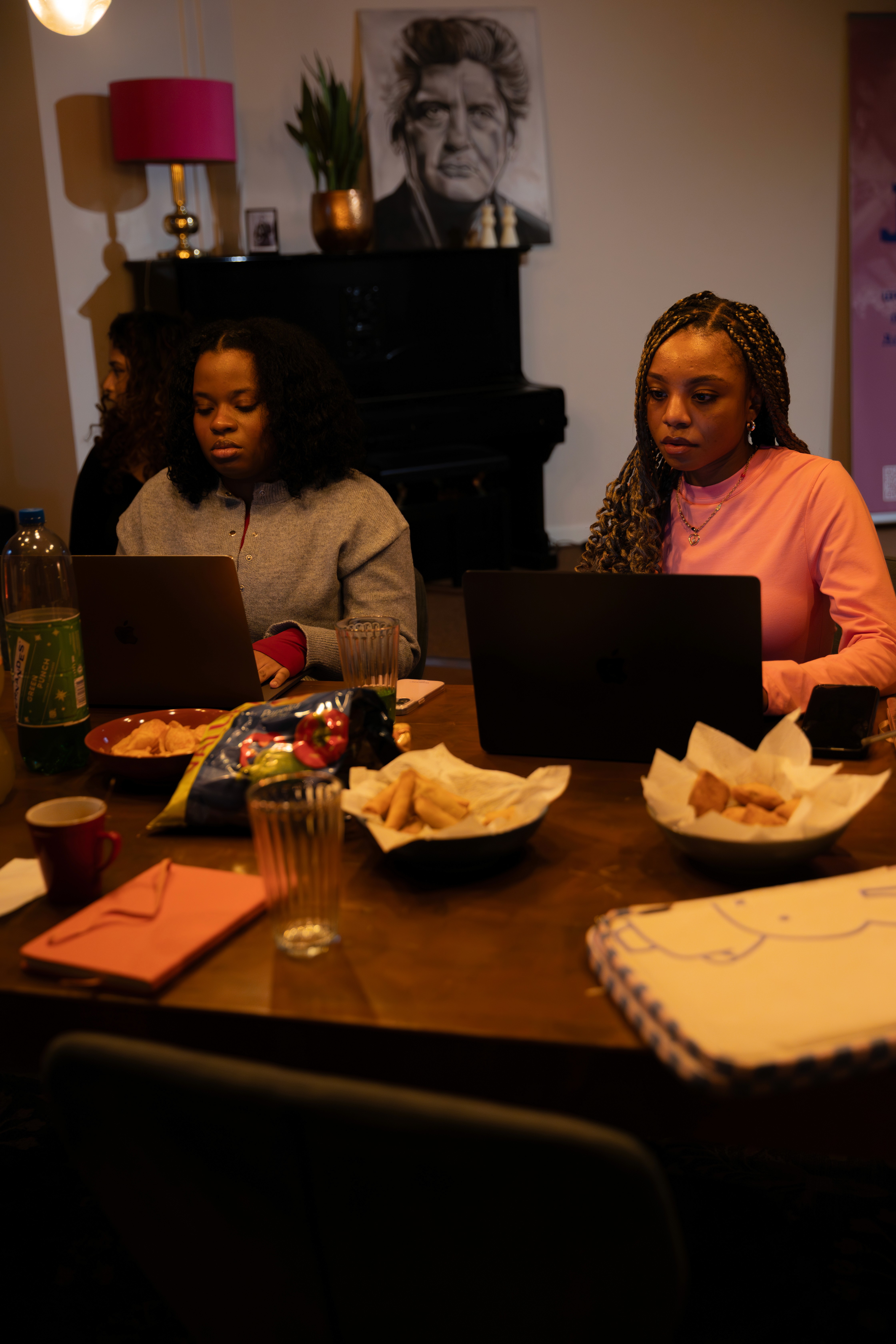 person sitting in a chair in front of a man