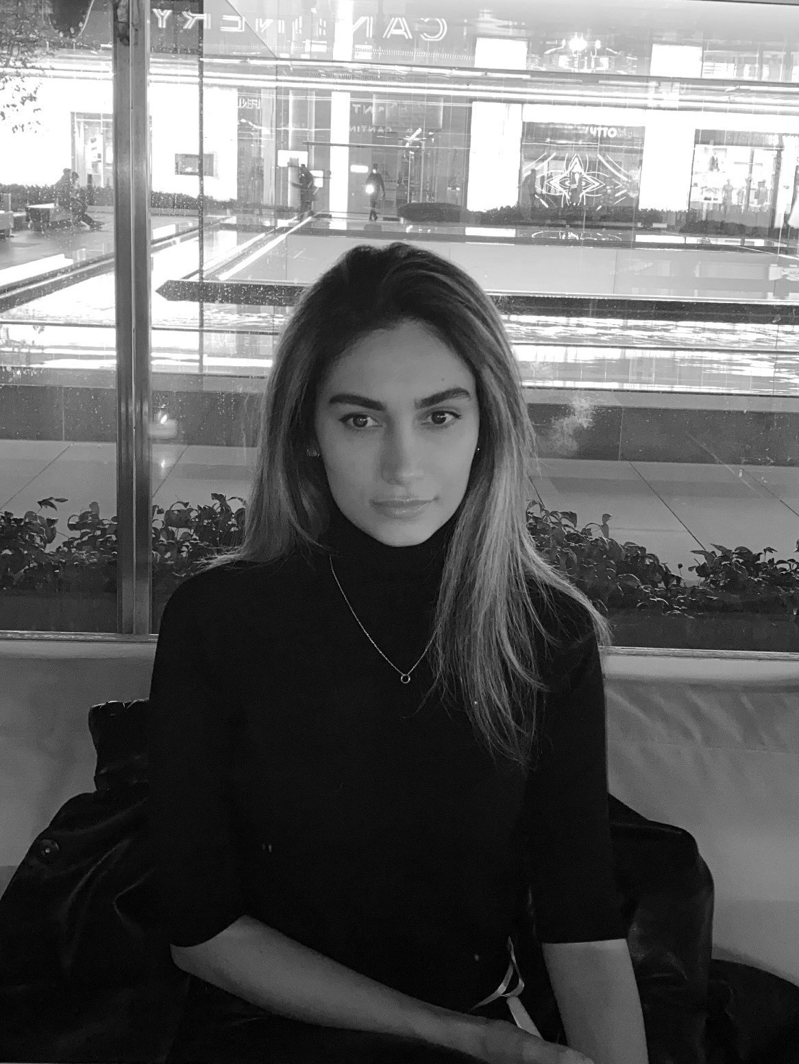 Close-up portrait with neutral expression and light hair