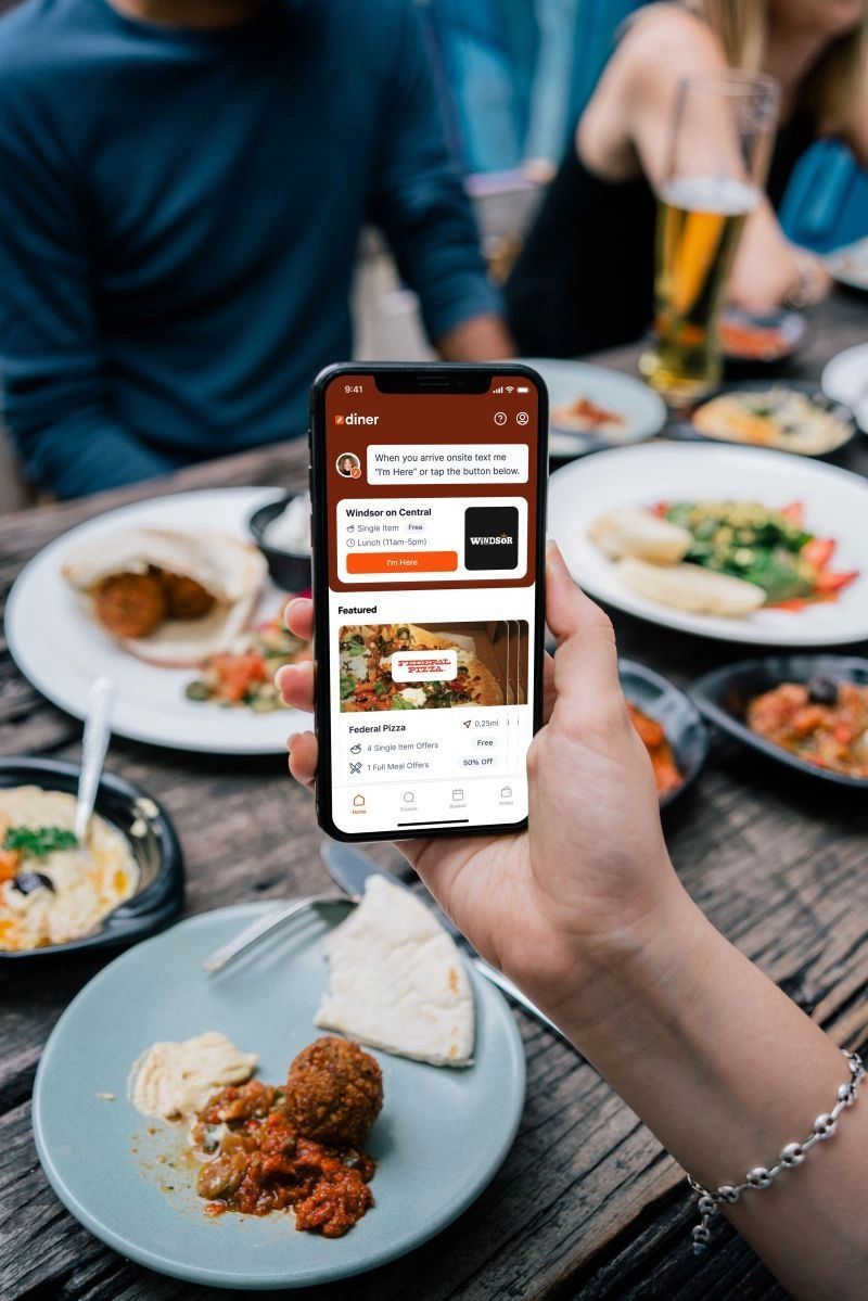 a black and white living room with a large tv