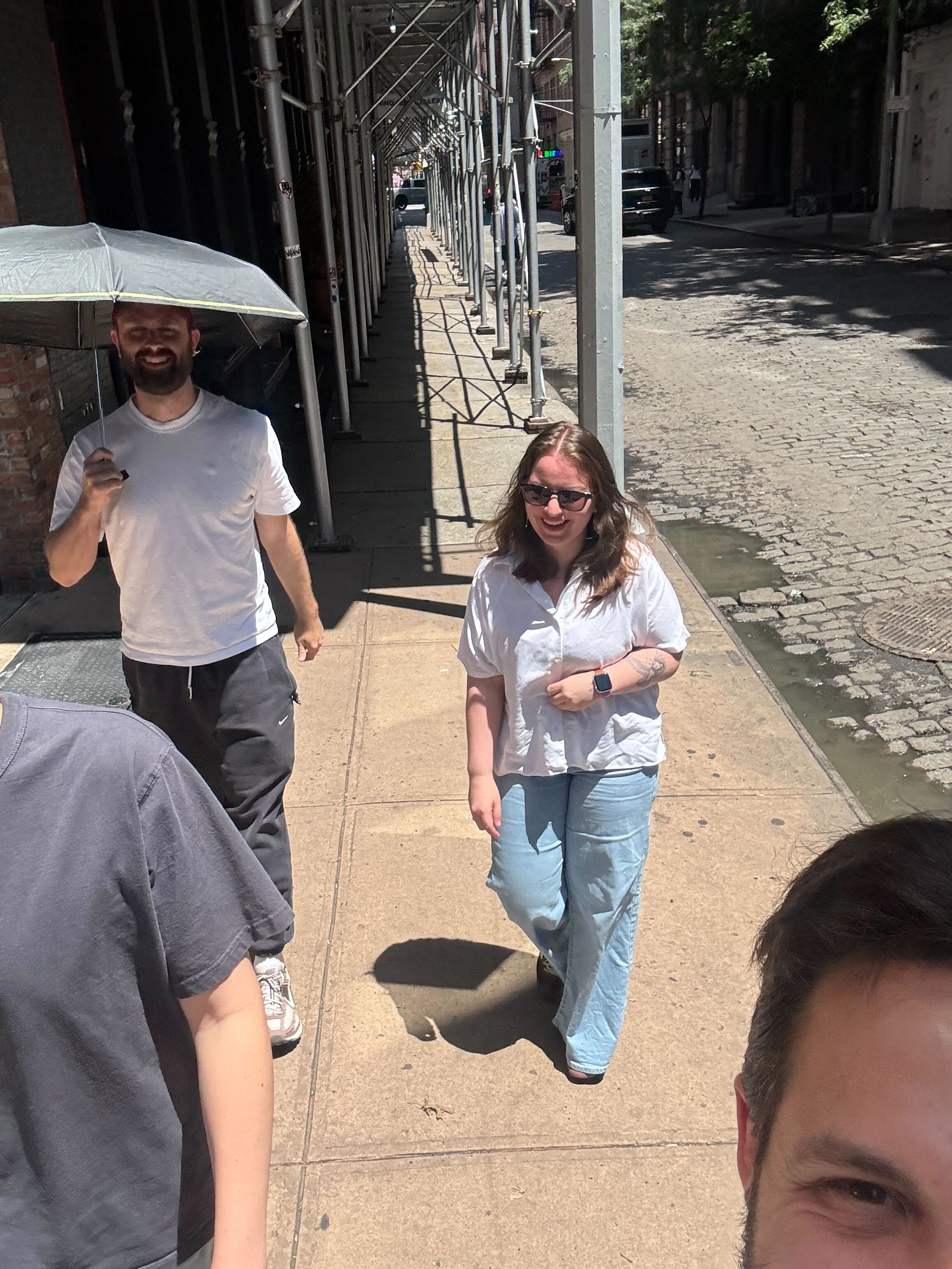Outdoor Café Seating in a Sunlit Alley